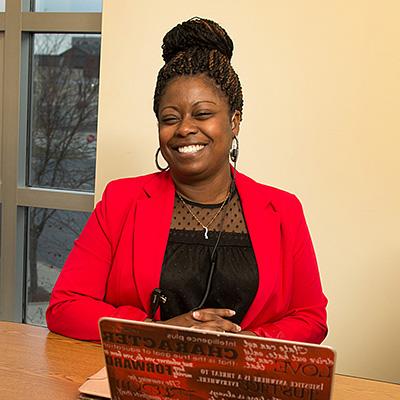 trenessa wood sitting at desk